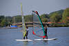 803024_ Windsurfer Surfschler Foto aus Eutin, Groer Eutiner See Jugendsport Paar mit Segel in Wind surfen