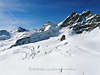 EA-0170_ Spuren im Schnee Foto unter Berner Alpen Berggipfel, Bergwelt am Aletschgletscher