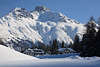 Berge St. Moritz Winterbild Romantik Hotelidylle in Schnee weisse Berglandschaft Foto