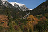 812813_ Oberstdorf Herbstlandschaft Blick auf Skischanze unter Allguer Alpen in Schnee