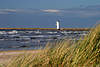 Ostsee Kste Leuchtturm Weie Leuchtbake Dnnengras in Wind bei Swinemnde